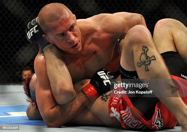 Fighter Georges St-Pierre battles Dan Hardy during their Welterweight title bout at UFC 111 at the Prudential Center on March 27, 2010 in Newark, New...