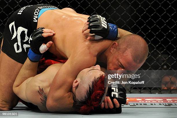 Fighter Georges St-Pierre battles Dan Hardy during their Welterweight title bout at UFC 111 at the Prudential Center on March 27, 2010 in Newark, New...