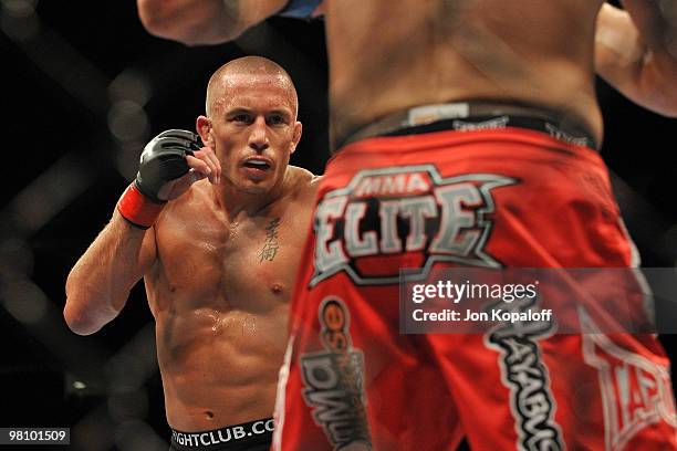 Fighter Georges St-Pierre battles Dan Hardy during their Welterweight title bout at UFC 111 at the Prudential Center on March 27, 2010 in Newark, New...