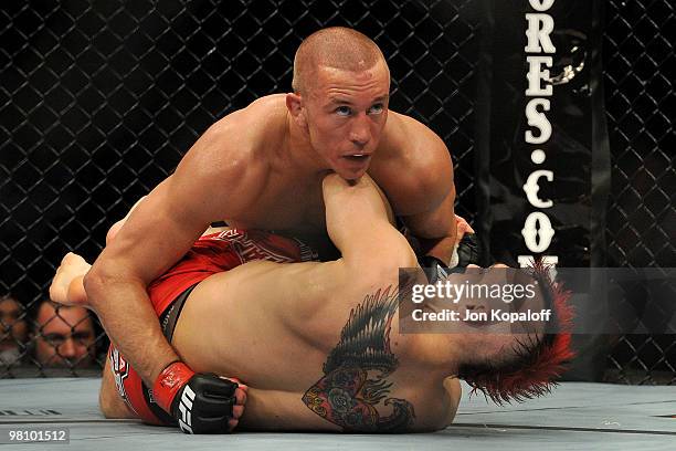 Fighter Georges St-Pierre battles Dan Hardy during their Welterweight title bout at UFC 111 at the Prudential Center on March 27, 2010 in Newark, New...