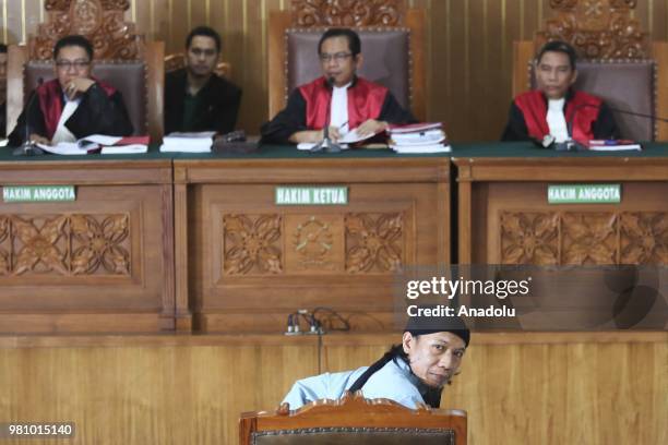 Defendant of terrorism case of Aman Abdurrahman, also known as Oman, before undergoing hearing of decision on him in South Jakarta District Court,...