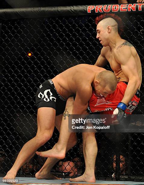Fighter Georges St-Pierre battles Dan Hardy during their Welterweight title bout at UFC 111 at the Prudential Center on March 27, 2010 in Newark, New...
