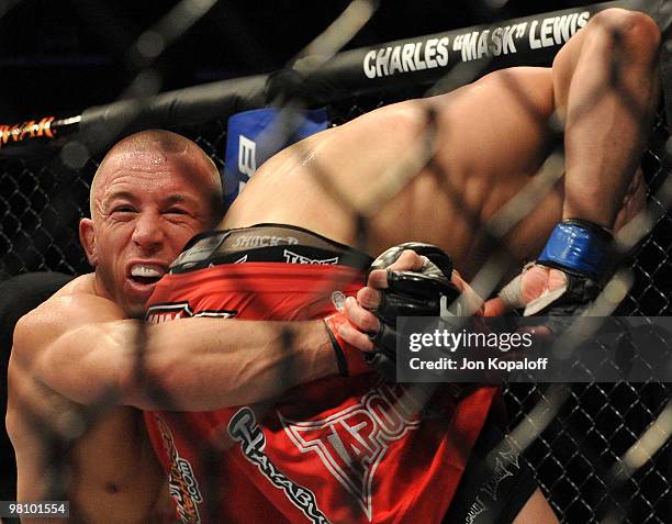 Fighter Georges St-Pierre battles Dan Hardy during their Welterweight title bout at UFC 111 at the Prudential Center on March 27, 2010 in Newark, New...