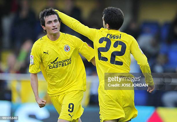 Villarreal's Joseba Llorente celebrate his goal with Rossi during their Spanish league football match on March 28, 2010 at Madrigal Stadium in...