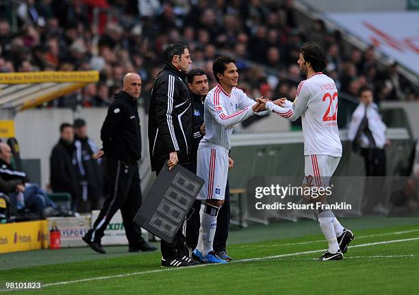 Ruud Van Nistelrooy of Hamburg is subsituted by Paolo Guerrero during the Bundesliga match between Borussia Moenchengladbach and Hamburger SV at...