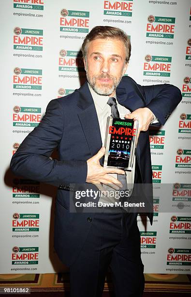 Christoph Waltz poses with the Best Actor during the Jameson Empire Film Awards at the Grosvenor House Hotel, on March 28, 2010 in London, England.
