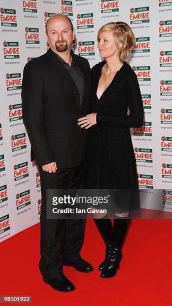 Director Neil Marshall and his wife actress Axelle Carolyn arrive for the Jameson Empire Film Awards held at the Grosvenor House Hotel, on March 28,...