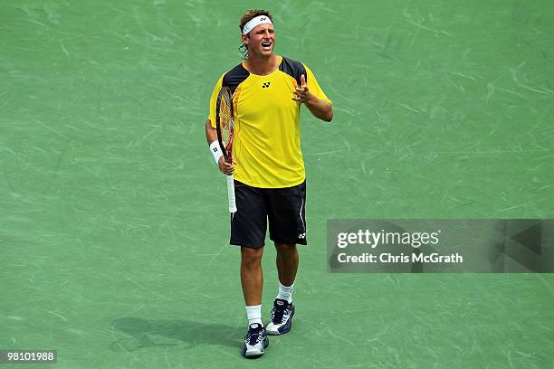 David Nalbandian of Argentina reacts after a shot against Rafael Nadal of Spain during day six of the 2010 Sony Ericsson Open at Crandon Park Tennis...