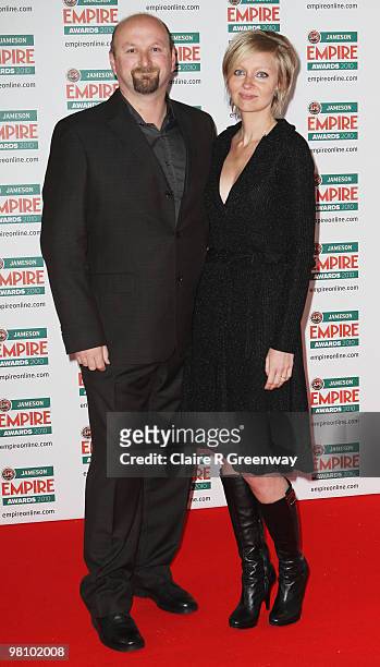Director Neil Marshall and actress/writer Axelle Carolyn arrive for the Jameson Empire Film Awards held at the Grosvenor House Hotel, on March 28,...
