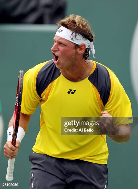 David Nalbandian of Argentina reacts after a shot against Rafael Nadal of Spain during day six of the 2010 Sony Ericsson Open at Crandon Park Tennis...