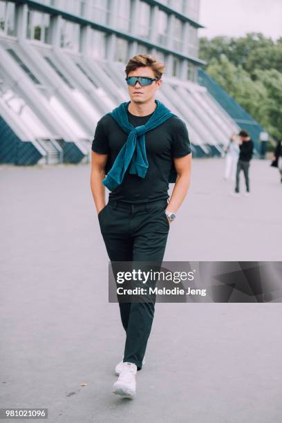 Oliver Cheshire outside AMI during Paris Fashion Week Mens Spring/Summer 2019 on June 21, 2018 in Paris, France.