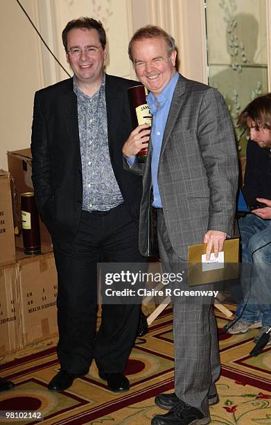 Ian Hislop and guest pose at the Winners Boards at the Jameson Empire Film Awards held at the Grosvenor House Hotel, on March 28, 2010 in London,...