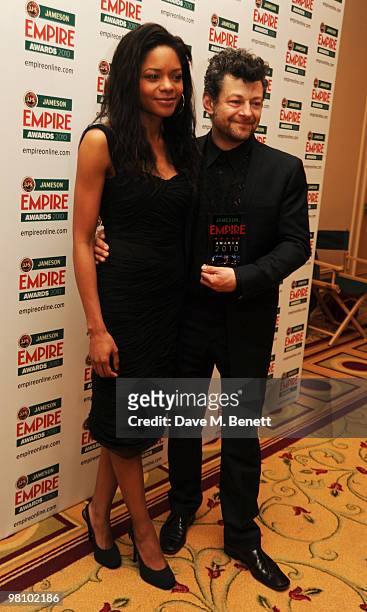 Andy Serkis poses with the Empire Inspiration Award presented by Naomie Harris during the Jameson Empire Film Awards at the Grosvenor House Hotel, on...