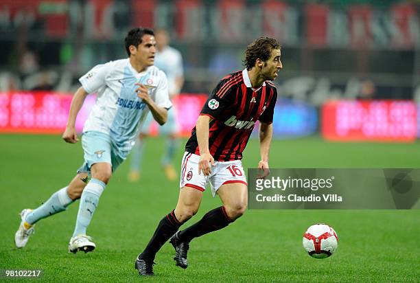 Mathieu Flamini of AC Milan competes for the ball with Cristian Ledesma of SS Lazio during the Serie A match between AC Milan and SS Lazio at Stadio...