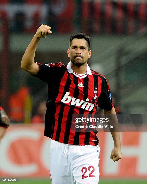 Marco Borriello of AC Milan celebrates after the first goal during the Serie A match between AC Milan and SS Lazio at Stadio Giuseppe Meazza on March...