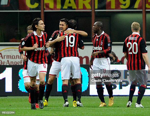 Marco Borriello of AC Milan celebrates after the first goal during the Serie A match between AC Milan and SS Lazio at Stadio Giuseppe Meazza on March...