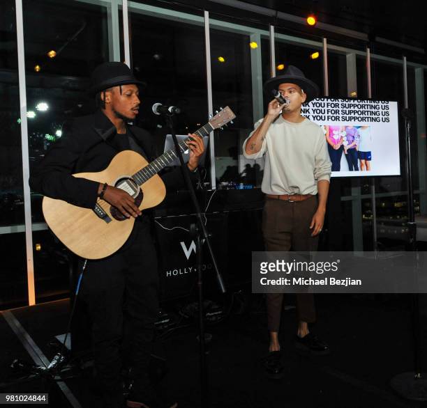 Palmer Reed and Evan Ross preform at Nights of Freedom LA on June 21, 2018 in Hollywood, California.