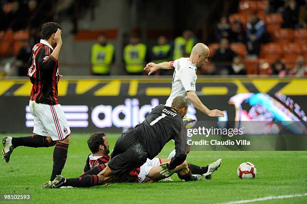 Dida of AC Milan competes for the ball with Tommaso Rocchi of SS Lazio during the Serie A match between AC Milan and SS Lazio at Stadio Giuseppe...