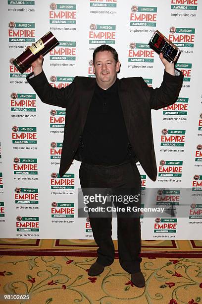 Johnny Vegas poses with award for Best Actress collected on behalf of Zoe Saldana at the Winners Boards at the Jameson Empire Film Awards held at the...