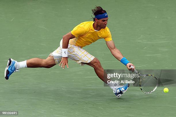 Rafael Nadal of Spain returns a shot against David Nalbandian of Argentina during day six of the 2010 Sony Ericsson Open at Crandon Park Tennis...