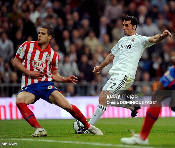 Real Madrid's defender Alvaro Arbeloa shoots to score during the Spanish league football match Real Madrid against Atletico Madrid at the Santiago...