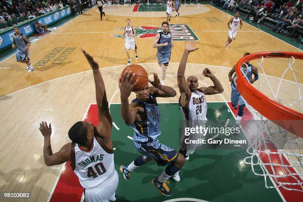 Rudy Gay of the Memphis Grizzlies shoots a layup against Kurt Thomas and Jerry Stackhouse of the Milwaukee Bucks on March 28, 2010 at the Bradley...