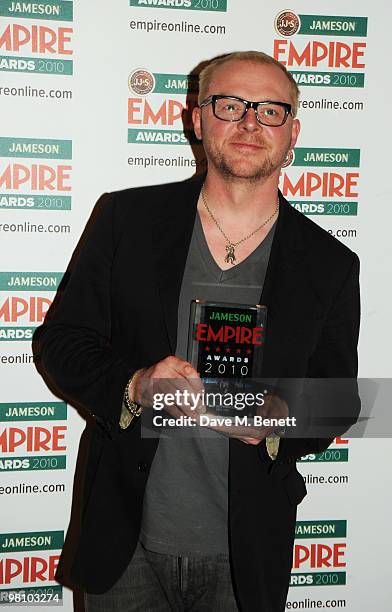 Simon Pegg poses with the Best Sci-Fi/Fantasy Award during the Jameson Empire Film Awards at the Grosvenor House Hotel, on March 28, 2010 in London,...