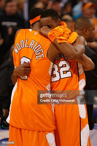 Renaldo Woodridge and Scotty Hopson both of the Tennessee Volunteers react to loosing to the Michigan State Spartans during the midwest regional...