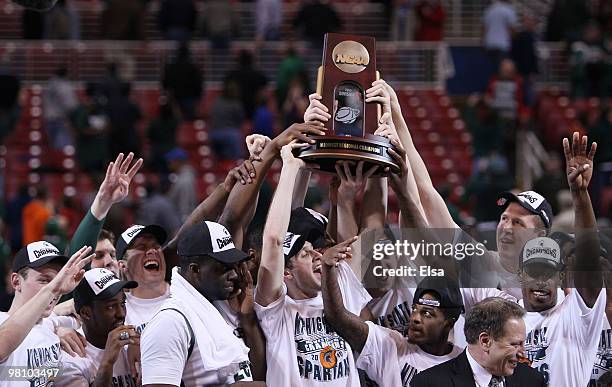 : : The Michigan State Spartans celebrate their win over the Tennessee Volunteers after the midwest regional final of the 2010 NCAA men's basketball...