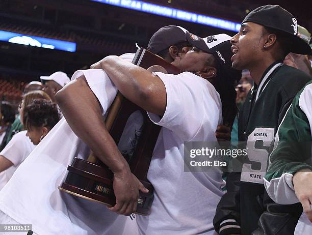 : Raymar Morgan of the Michigan State Spartans is congratulated by fans after the win over the Tennessee Volunteers during the midwest regional final...