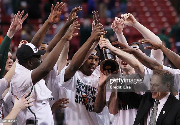 : : : : The Michigan State Spartans celebrate their win over the Tennessee Volunteers after the midwest regional final of the 2010 NCAA men's...