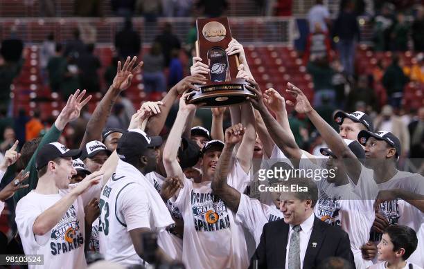 : : : The Michigan State Spartans celebrate their win over the Tennessee Volunteers after the midwest regional final of the 2010 NCAA men's...