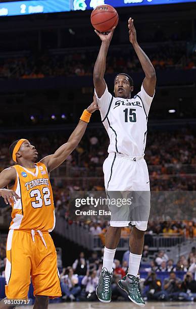 Durrell Summers of the Michigan State Spartans takes a shot as Scotty Hopson of the Tennessee Volunteers defends during the midwest regional final of...