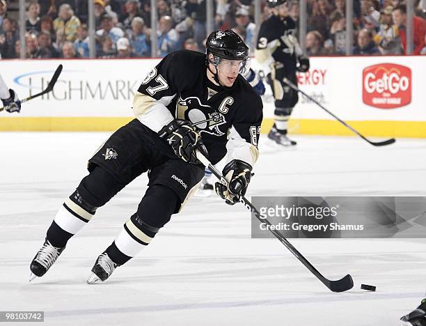 Sidney Crosby of the Pittsburgh Penguins moves the puck up ice against the Toronto Maple Leafs on March 28, 2010 at Mellon Arena in Pittsburgh,...