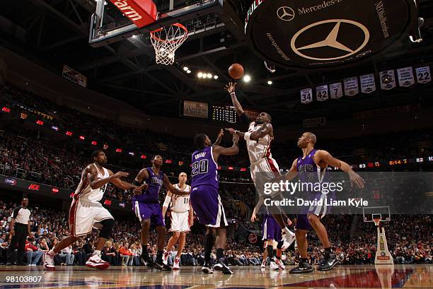 Antawn Jamison of the Cleveland Cavaliers puts up the shot against Donte Greene and Ime Udoka of the Sacramento Kings on March 28, 2010 at The...