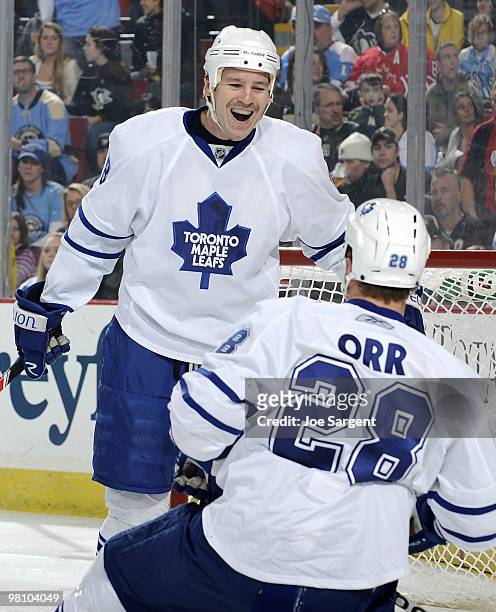 Colton Orr of the Toronto Maple Leafs celebrates his goal with Wayne Primeau against the Pittsburgh Penguins on March 28, 2010 at Mellon Arena in...