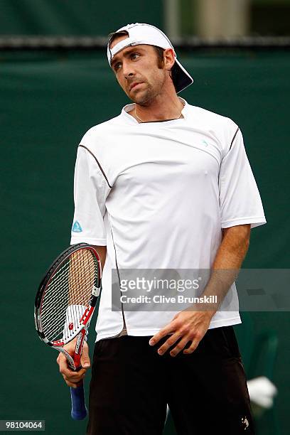 Benjamin Becker of Germany reacts against Tommy Robredo of Spain during day six of the 2010 Sony Ericsson Open at Crandon Park Tennis Center on March...