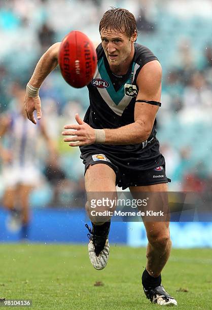 Jay Schulz of the Power chaese the ball during the round one AFL match between the Port Adelaide Power and the North Melbourne Kangaroos at AAMI...