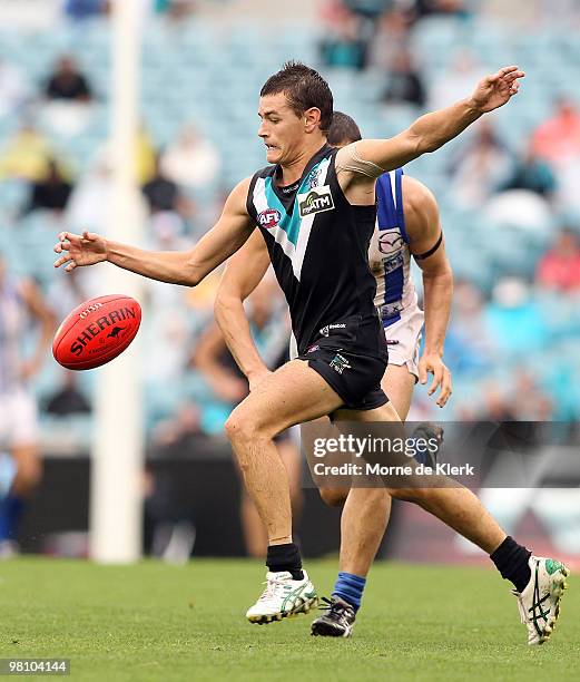 Cameron Hitchcock of the Power kicks during the round one AFL match between the Port Adelaide Power and the North Melbourne Kangaroos at AAMI Stadium...