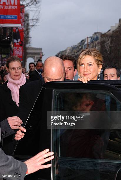 Actress Jennifer Aniston leaves the premiere of the film 'Le chasseur de Primes' at Cinema Gaumont Marignan on March 28, 2010 in Paris, France.