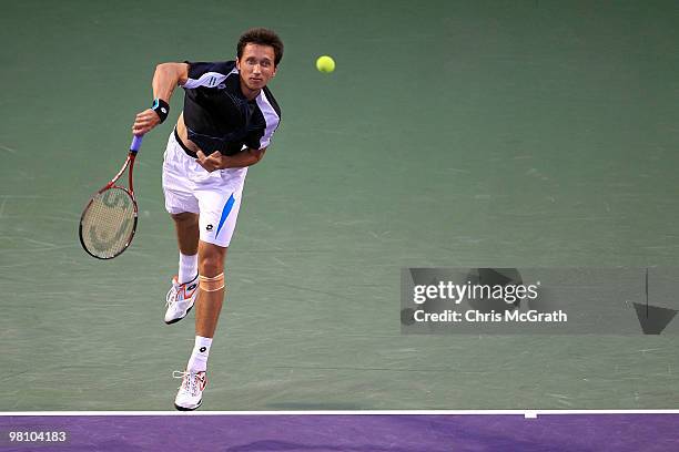 Sergiy Stakhovsky of the Ukraine serves against Andy Roddick of the United States during day six of the 2010 Sony Ericsson Open at Crandon Park...