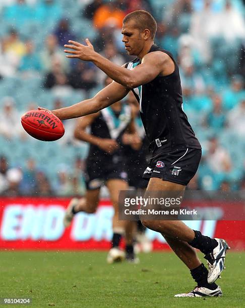 Nathan Krakouer of the Power kicks during the round one AFL match between the Port Adelaide Power and the North Melbourne Kangaroos at AAMI Stadium...