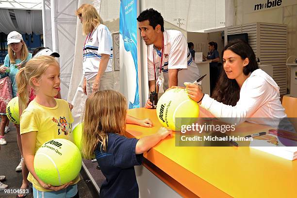 Marion Bartoli of France signs autographs for fans during day six of the 2010 Sony Ericsson Open at Crandon Park Tennis Center on March 28, 2010 in...