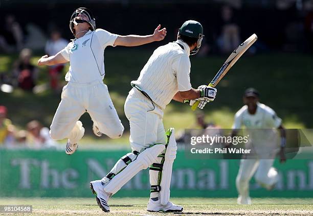 Watling of New Zealand leaps up as he celebrates catching out Ricky Ponting of Australia during day three of the Second Test Match between New...