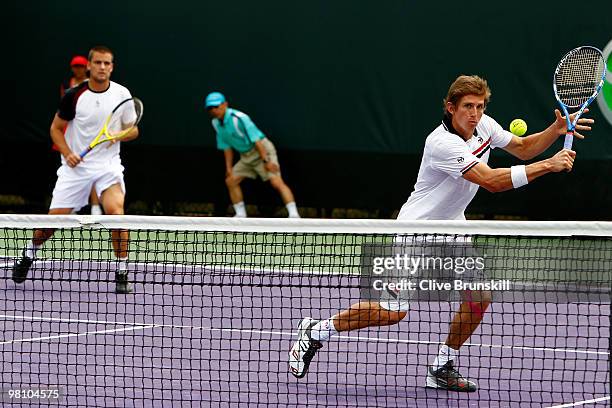 Mikhail Youzhny and Igor Andreev play against Mark Knowles of Bahamas and Mardy Fish of the United States during day six of the 2010 Sony Ericsson...