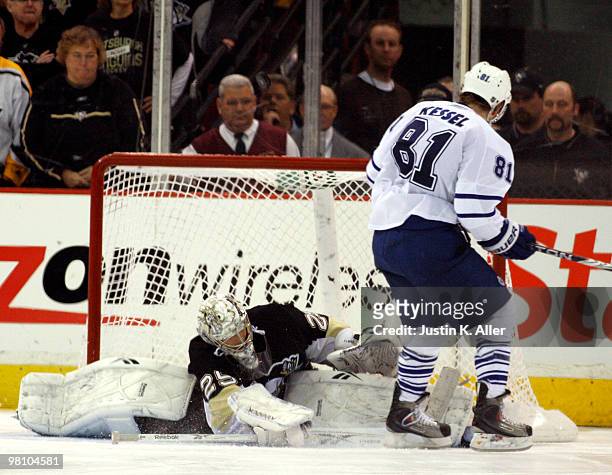 Marc-Andre Fleury of the Pittsburgh Penguins makes a save on Phil Kessel of the Toronto Maple Leafs in the shootout at Mellon Arena on March 28, 2010...