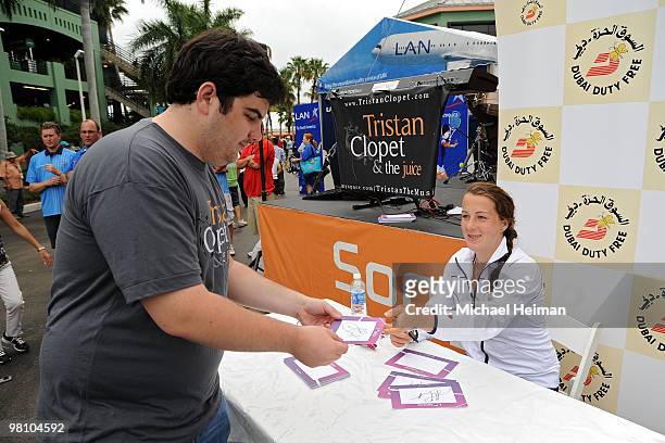 Anastasia Pavlyuchenkova of Russia signs autographs for fans during day six of the 2010 Sony Ericsson Open at Crandon Park Tennis Center on March 28,...