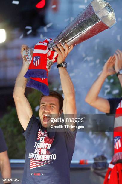 Gabi Fernandez of Atletico Madrid holds the cup during the celebration of Atletico Madrid on May 18, 2018 in Madrid, Spain.