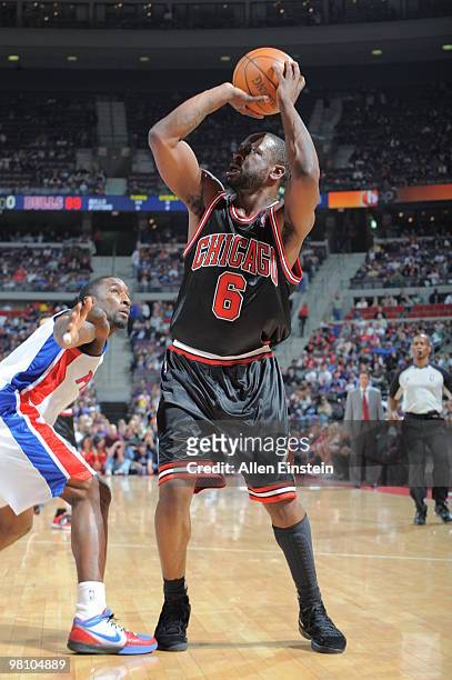 Ronald Murray of the Chicago Bulls taking a shot over Ben Gordon of the Detroit Pistons in a game at the Palace of Auburn Hills on March 28, 2010 in...