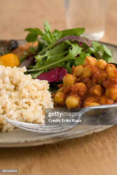 unpolished rice, garbanzo curry and vegetable - vegetable curry stock pictures, royalty-free photos & images